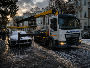 Porsche lifted by HIAB crane